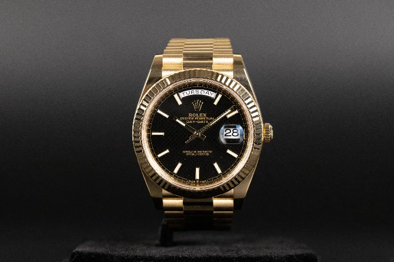 Rolex<br>228238 DayDate 40 Black Diagonal Motif Dial